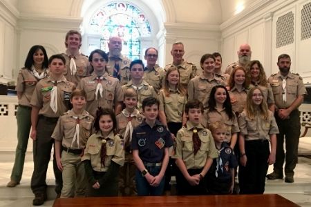 boy and girl Scouts at Sunday worship